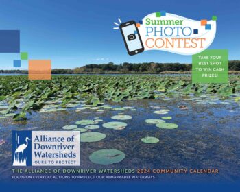 A lake full of lily pads with trees on the shore in the background. On the bototm of the image it says Alliance of Downriver Watersheds 2024 Community Caldendar: Focus on Everyday Actions to Protect Our Remarkable Waterways. On the top right there is text that says Summer Photo Contest: Take your best shot to win cash prizes!